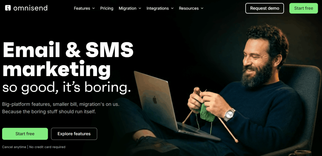 AWeber alternatives: A bearded man sits on a couch knitting and smiling at a laptop. Text reads: Email & SMS marketing so good, it’s boring. Two green buttons say Start free and Explore features.